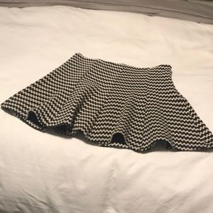 Black and white mini skirt.